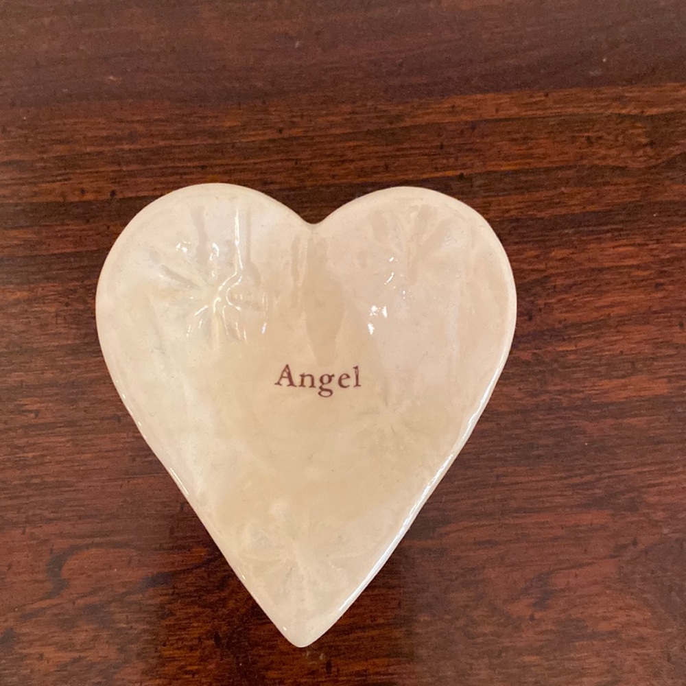 Ceramic heart-shaped ring dish with “Angel” printed inside w/ embossed flowers.